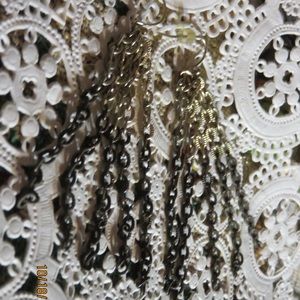 Costume jewelry brown metal dangle pierced earring